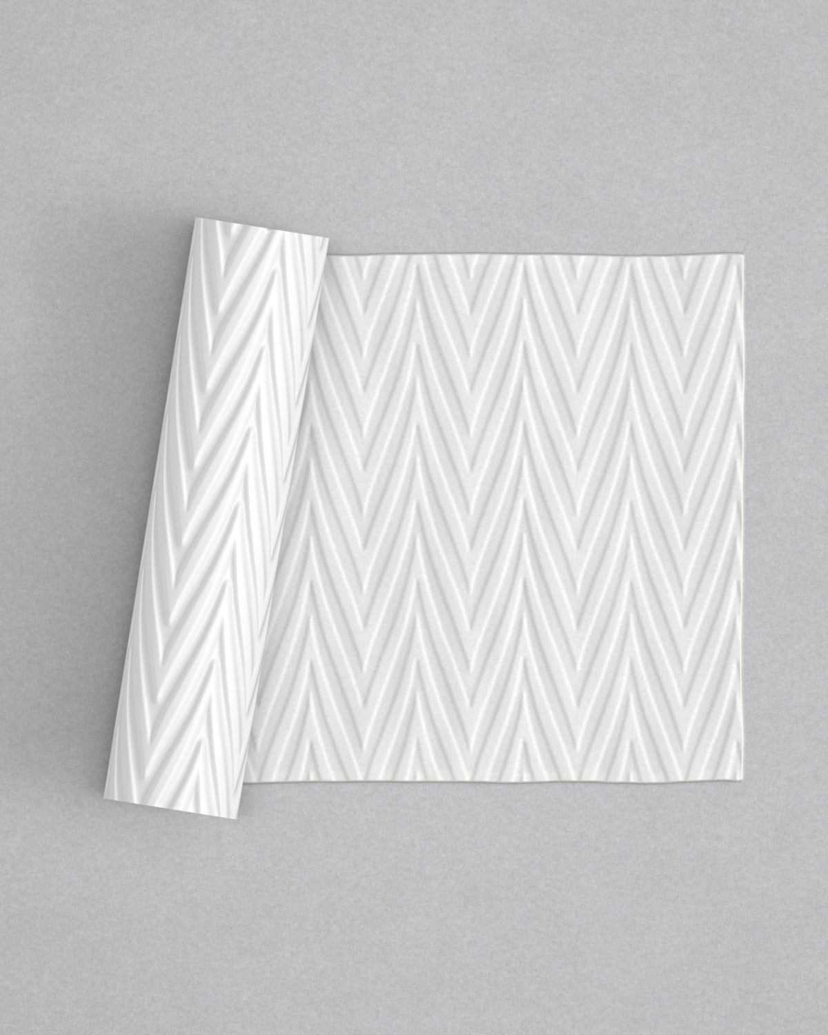 No.31 Zigzag mini 4" texture rolling pin with its pattern rolled out on white fondant - Prop Options