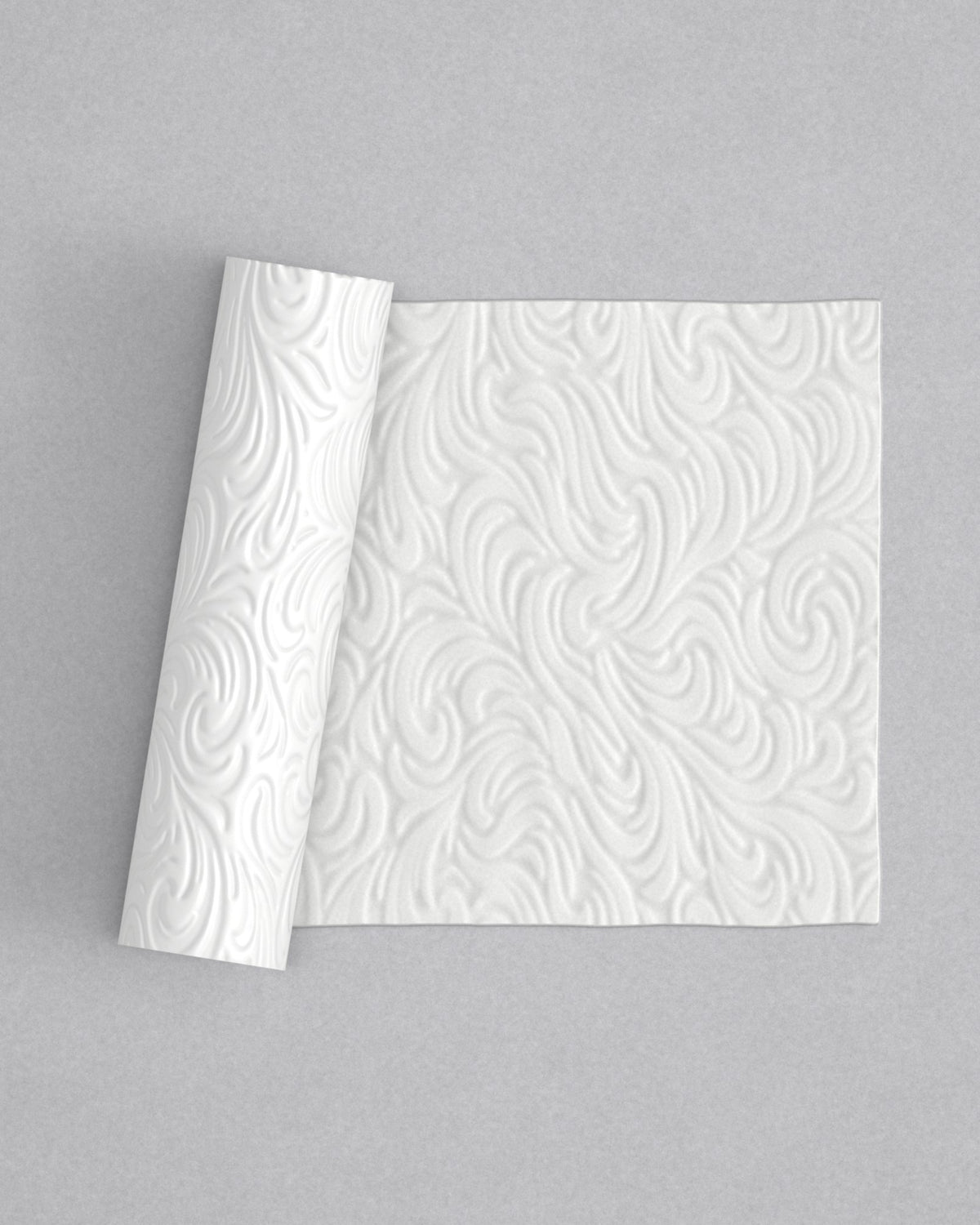 No.40 Rococo mini 4" texture rolling pin with its pattern rolled out on white fondant - Prop Options