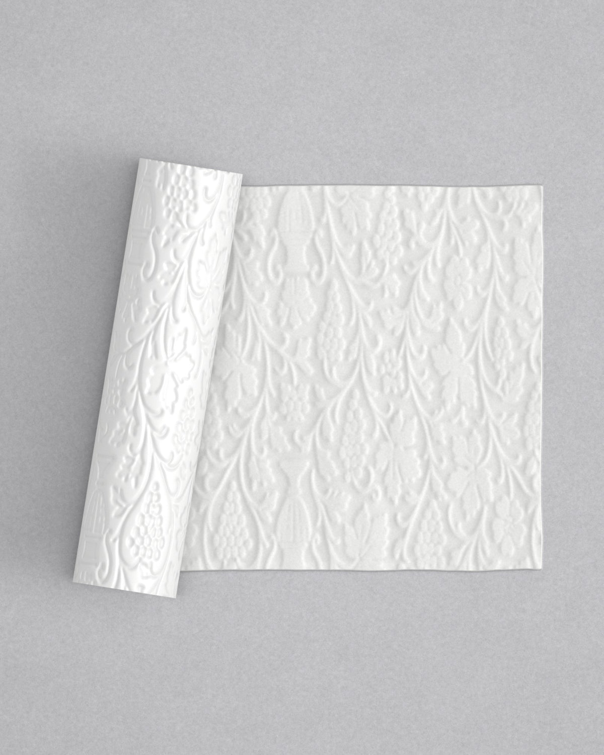 No.41 Vineyard mini 4" texture rolling pin with its pattern rolled out on white fondant - Prop Options
