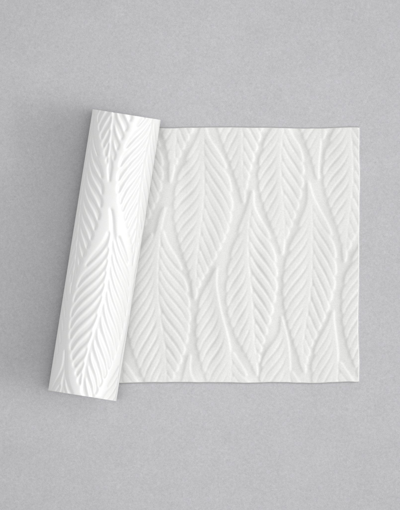 No.22 Palm mini 4" texture rolling pin with its pattern rolled out on white fondant - Prop Options