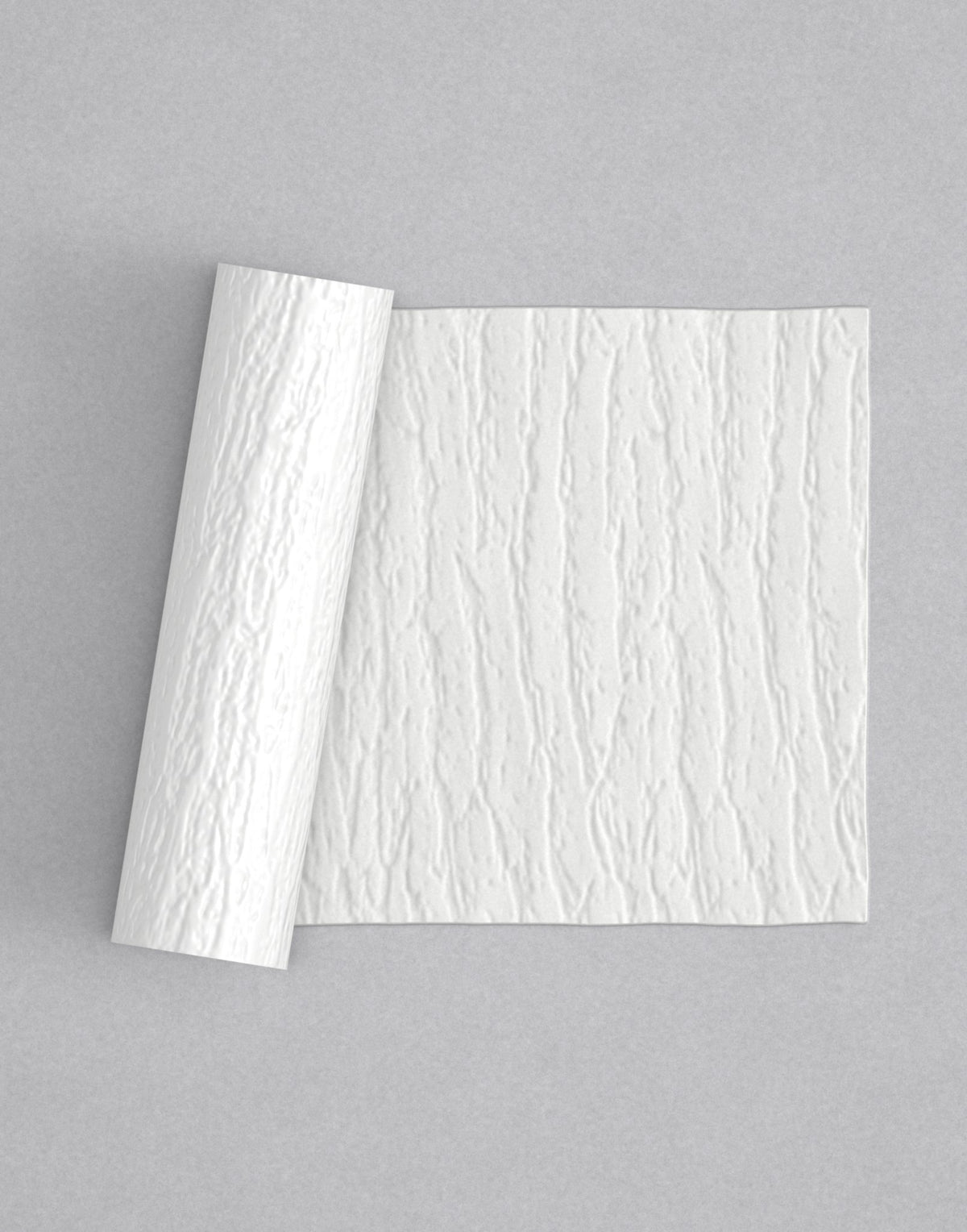 No.24 Bark mini 4" texture rolling pin with its pattern rolled out on white fondant - Prop Options