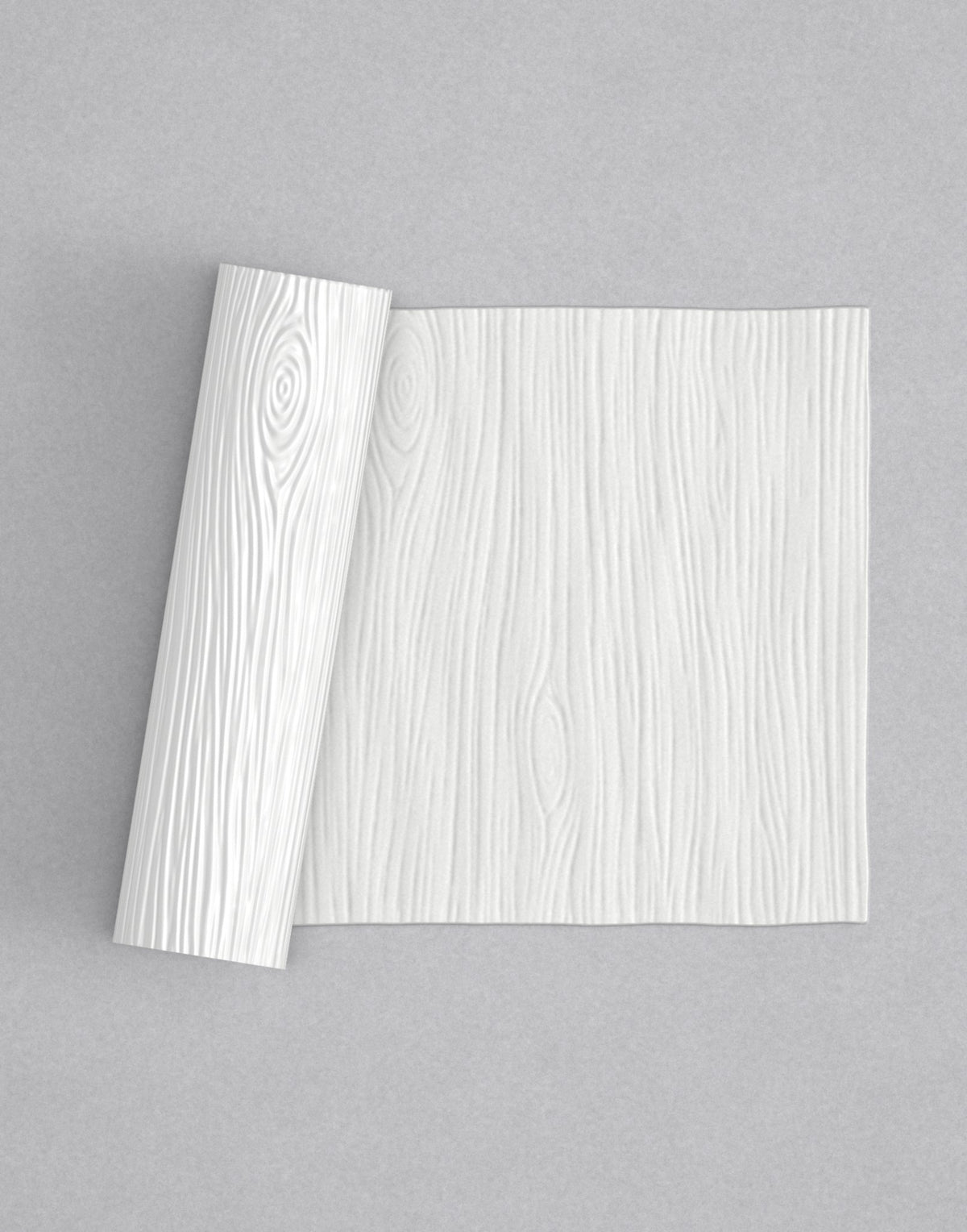 No.25 Woodgrain mini 4" texture rolling pin with its pattern rolled out on white fondant - Prop Options