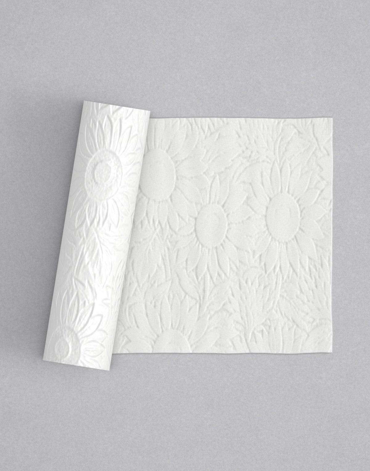 No.27 Solstice mini 4" texture rolling pin with its pattern rolled out on white fondant - Prop Options