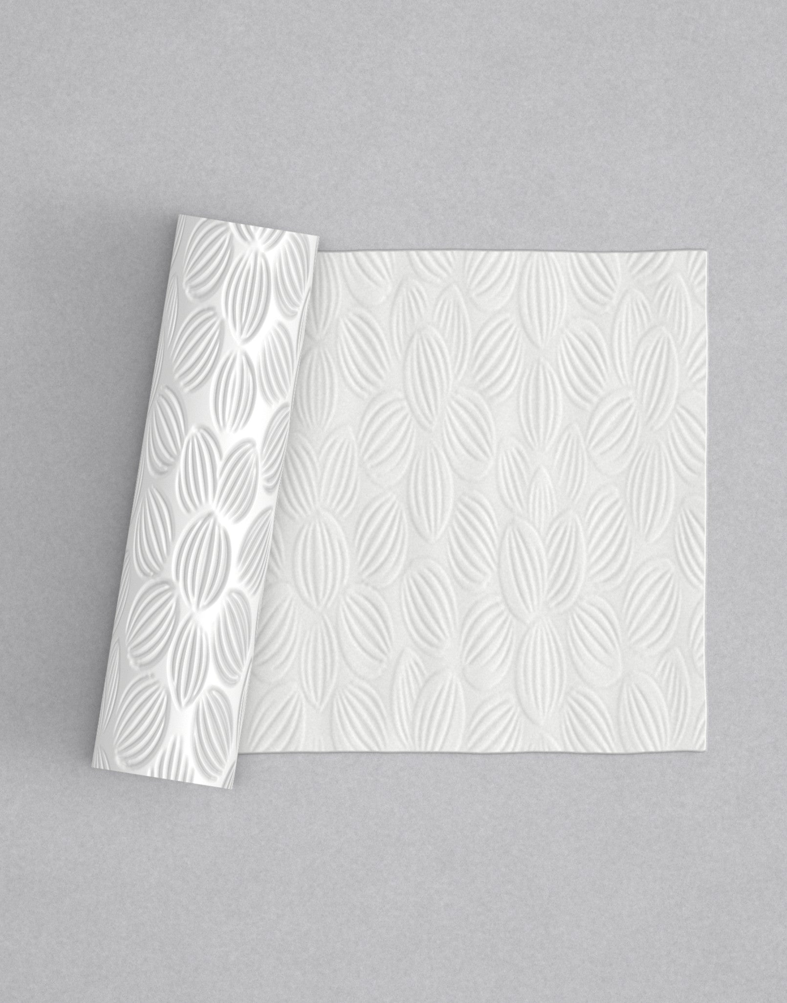 No.32 Pettula mini 4" texture rolling pin with its pattern rolled out on white fondant - Prop Options