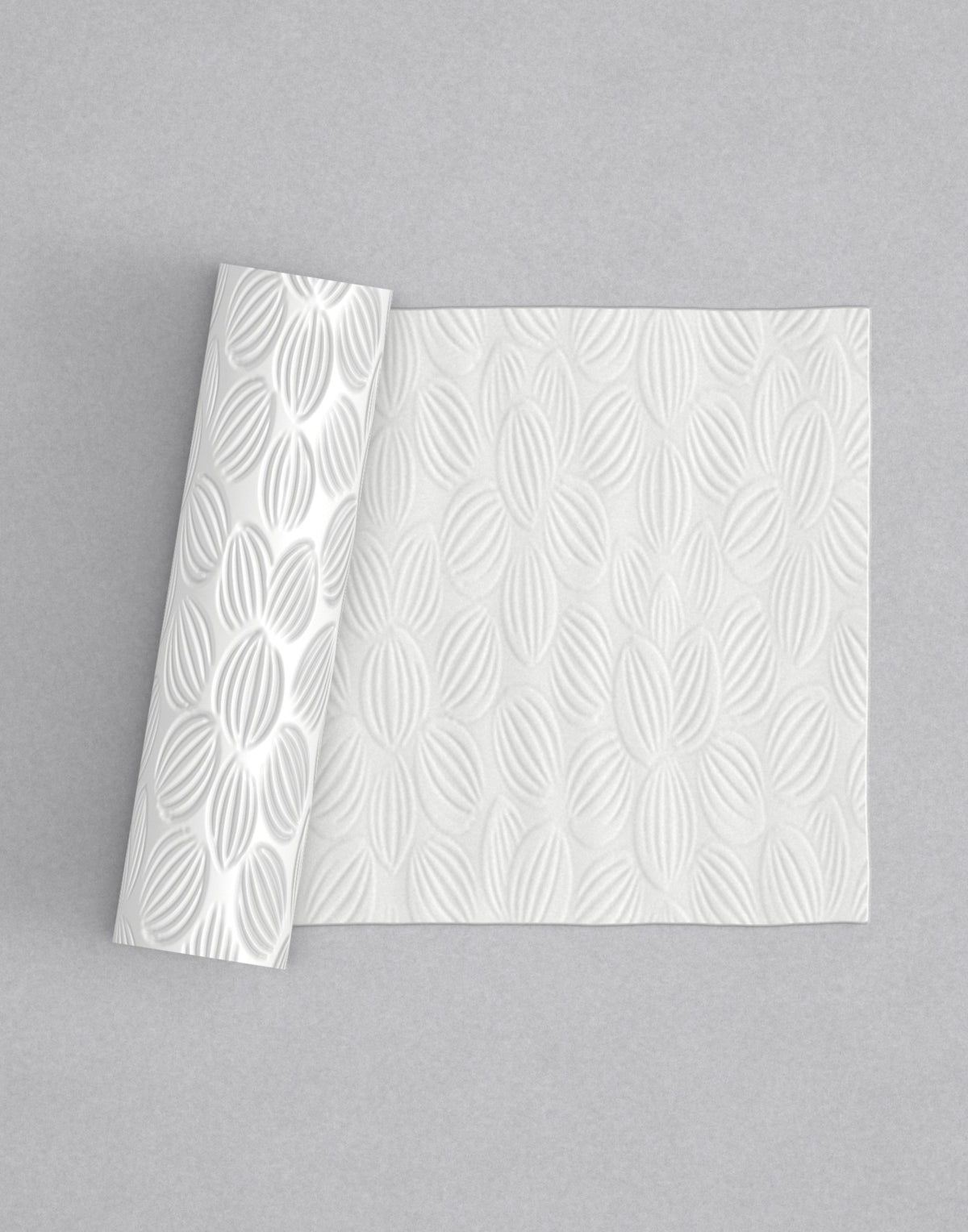 No.32 Pettula mini 4" texture rolling pin with its pattern rolled out on white fondant - Prop Options
