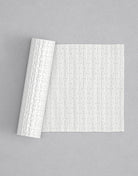 No.56 Tressix mini 4" texture rolling pin with its pattern rolled out on white fondant - Prop Options