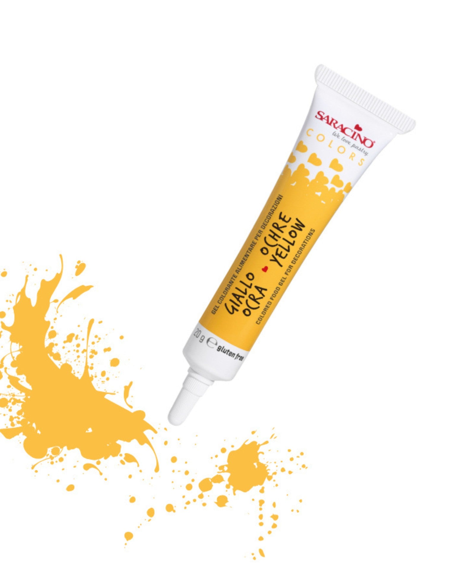 Tube of yellow food color with splashes on a white background
