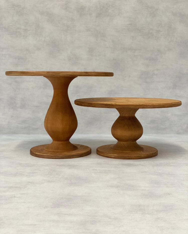 Two Teardrop Scandinavian Birch Cake Stands in tall and standard size in a light finish - Prop Options